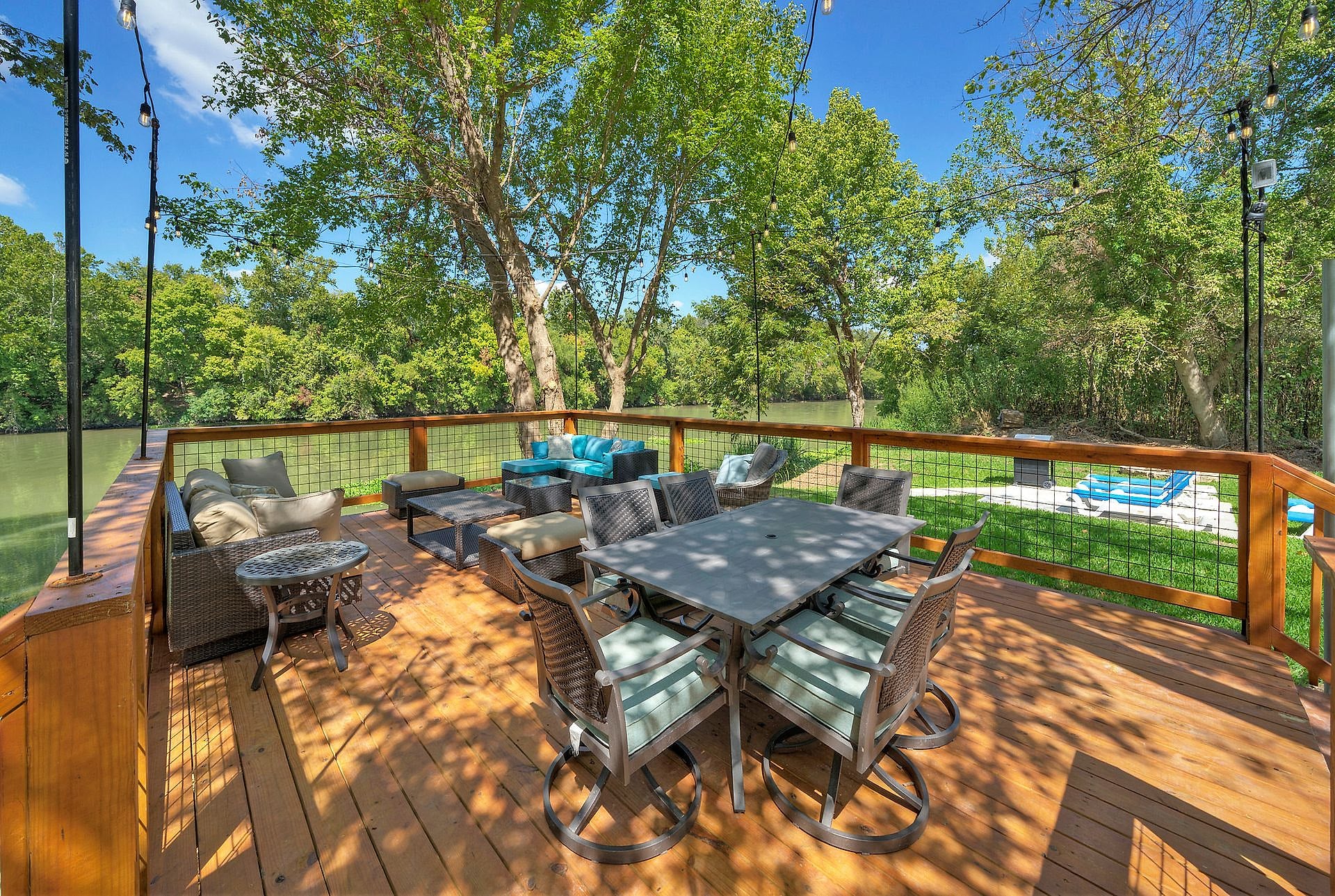 Outdoor dining table on the river viewing deck overlooking the Colorado River