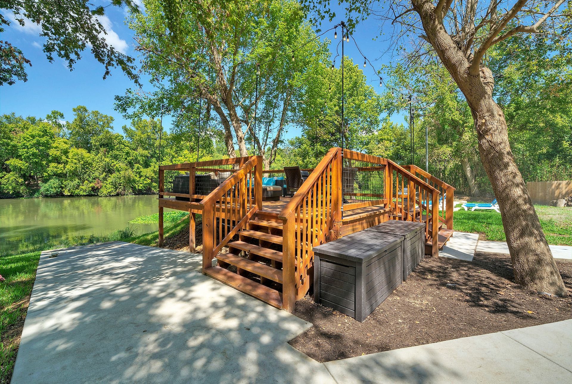 Wooden stairs up to the river viewing deck at River Bend Bliss
